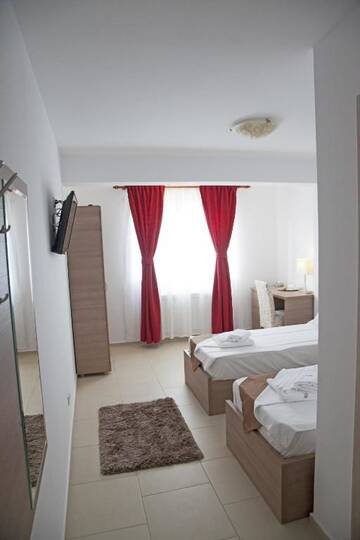 Фото номера Двухместный номер с 2 отдельными кроватями Отель Hotel Nova Residence г. Бухарест 20