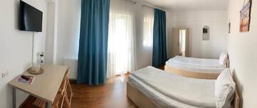 Фото номера Двухместный номер с 2 отдельными кроватями Отель Hotel Nova Residence г. Бухарест 5