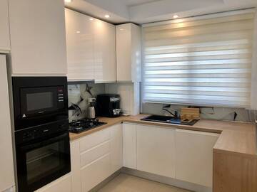 Фото номера Дом с 2 спальнями Дома для отпуска Bucharest Holiday Villa г. Бухарест 8