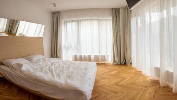 Фото номера Апартаменты Делюкс с 1 спальней и террасой Апарт-отели Blend City Center г. Бухарест 6