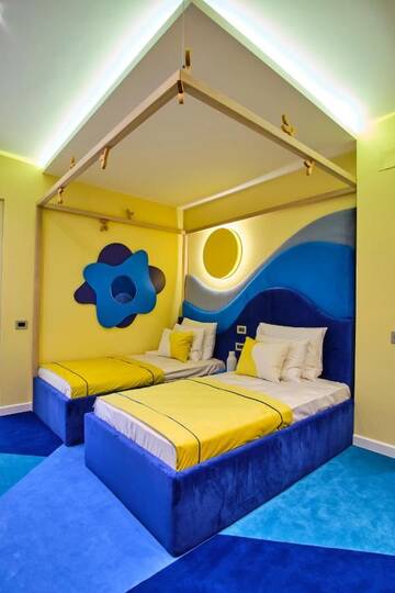 Фото номера Двухместный номер Делюкс с 2 отдельными кроватями Отель Vilacrosse Boutique Inn г. Бухарест 3
