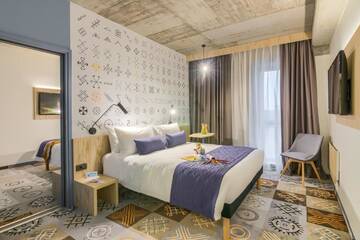 Фото номера Стандартный двухместный номер с 1 кроватью Отель ibis Styles Bucharest City Center г. Бухарест 6