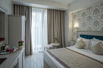 Фото номера Номер Делюкс с балконом Отель Old Town Boutique Hotel г. Бухарест 3