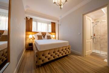 Фото номера Стандартный двухместный номер с 1 кроватью Отель Hotel Casa Fiori г. Бухарест 4