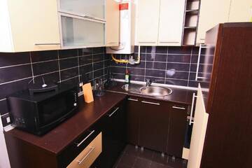Фото номера Апартаменты Делюкс с 2 спальнями Отель Harmony Residence г. Бухарест 6