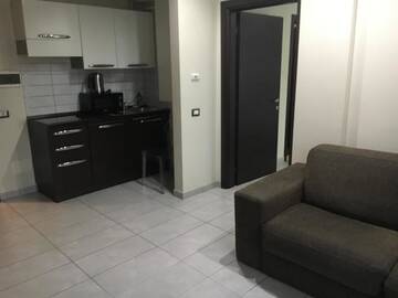 Фото номера Семейный номер-студио Делюкс Отель Harmony Residence г. Бухарест 3