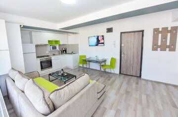 Фото номера Люкс с террасой Отель Harmony Suites г. Бухарест 8