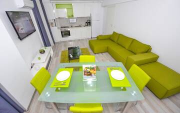 Фото номера Апартаменты с 1 спальней Отель Harmony Suites г. Бухарест 11