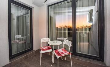 Фото номера Апартаменты с 1 спальней Отель Harmony Suites г. Бухарест 19