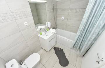 Фото номера Люкс с 1 спальней Отель Harmony Suites г. Бухарест 15
