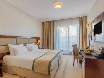 Фото номера Номер делюкс с балконом Отель Concorde Old Bucharest Hotel г. Бухарест 9
