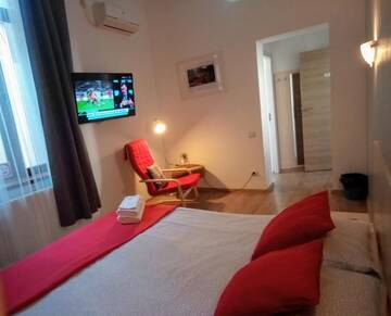 Фото номера Улучшенный двухместный номер с 1 кроватью Гостевой дом Central Guesthouse г. Бухарест 6