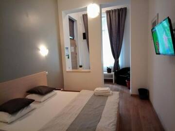 Фото номера Улучшенный двухместный номер с 1 кроватью Гостевой дом Central Guesthouse г. Бухарест 8