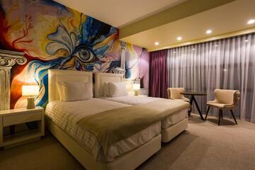Фото номера Двухместный номер с 2 отдельными кроватями Отель Ganzo Boutique Hotel г. Бухарест 7