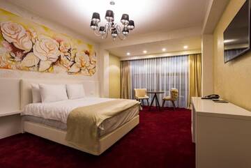 Фото номера Двухместный номер «Премиум» с 1 кроватью Отель Ganzo Boutique Hotel г. Бухарест 11