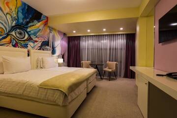 Фото номера Двухместный номер с 2 отдельными кроватями Отель Ganzo Boutique Hotel г. Бухарест 8