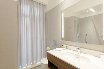 Фото номера Номер с кроватью размера «king-size» Отель Hilton Garden Inn Bucharest г. Бухарест 5