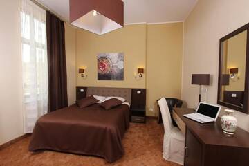 Фото номера Двухместный номер с 1 кроватью Отель Hotel Reginetta г. Бухарест 4
