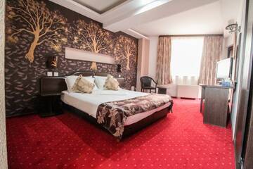 Фото номера Двухместный номер с 1 кроватью и балконом Отель Hotel Razvan г. Бухарест 14