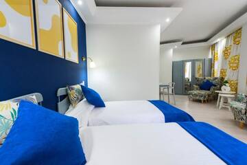 Фото номера Двухместный номер с 2 отдельными кроватями Отель Relax Comfort Suites Hotel г. Бухарест 11