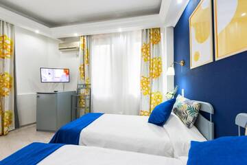 Фото номера Двухместный номер с 2 отдельными кроватями Отель Relax Comfort Suites Hotel г. Бухарест 10