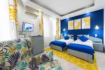 Фото номера Двухместный номер с 2 отдельными кроватями Отель Relax Comfort Suites Hotel г. Бухарест 15