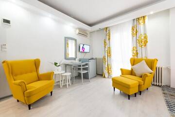 Фото номера Улучшенный двухместный номер с 1 кроватью Отель Relax Comfort Suites Hotel г. Бухарест 8