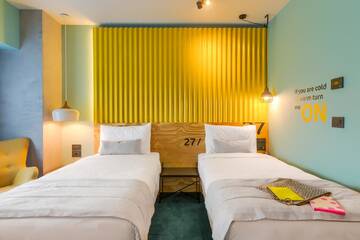 Фото номера Стандартный двухместный номер с 2 отдельными кроватями Отель ibis Styles Bucharest Erbas г. Бухарест 6