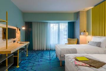 Фото номера Стандартный двухместный номер с 2 отдельными кроватями Отель ibis Styles Bucharest Erbas г. Бухарест 7