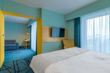 Фото номера Семейный номер с диваном-кроватью Отель ibis Styles Bucharest Erbas г. Бухарест 2