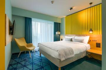 Фото номера Семейный номер с диваном-кроватью Отель ibis Styles Bucharest Erbas г. Бухарест 3