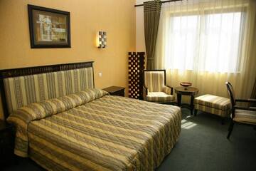 Фото номера Двухместный номер с 1 кроватью Отель Hotel Tecadra г. Бухарест 10