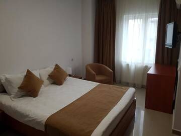 Фото номера Улучшенный двухместный номер с 1 кроватью Отель Hotel Top Central г. Бухарест 16