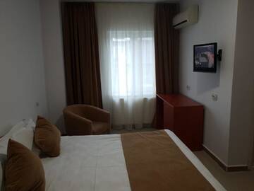 Фото номера Улучшенный двухместный номер с 1 кроватью Отель Hotel Top Central г. Бухарест 17