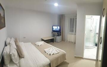 Фото номера Улучшенный двухместный номер с 1 кроватью Отель Hotel Top Central г. Бухарест 33
