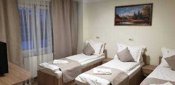 Фото номера Улучшенный двухместный номер с 2 отдельными кроватями Отель Hotel Top Central г. Бухарест 5