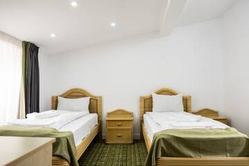 Фото номера Стандартный двухместный номер с 2 отдельными кроватями Отель Casa Gabriela г. Бухарест 5