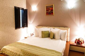 Фото номера Улучшенные апартаменты с 2 спальнями Отель Phoenicia Suites Baneasa г. Бухарест 11