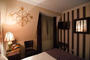 Фото номера Стандартный двухместный номер с 1 кроватью Отель Hotel Boutique Monaco г. Бухарест 6