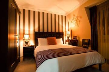 Фото номера Стандартный двухместный номер с 1 кроватью Отель Hotel Boutique Monaco г. Бухарест 5