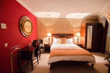 Фото номера Улучшенный двухместный номер с 1 кроватью Отель Hotel Boutique Monaco г. Бухарест 13