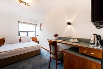 Фото номера Двухместный номер эконом-класса с 1 кроватью Отель Hotel Duke Romana г. Бухарест 14