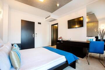 Фото номера Апартаменты с 2 спальнями Отель Hotel Duke Romana г. Бухарест 8