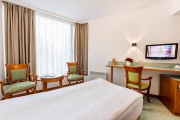 Фото номера Двухместный номер эконом-класса с 2 отдельными кроватями Отель Hotel Duke Romana г. Бухарест 10
