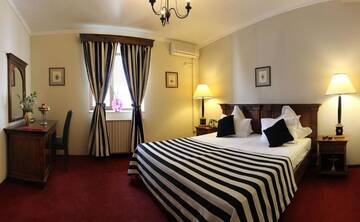 Фото номера Стандартный двухместный номер с 1 кроватью Отель Arc de Triomphe by Residence Hotels г. Бухарест 4