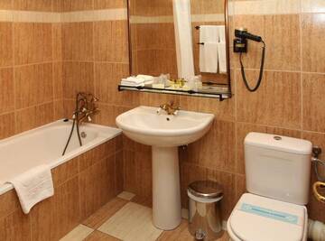 Фото номера Стандартный двухместный номер с 1 кроватью Отель Arc de Triomphe by Residence Hotels г. Бухарест 12