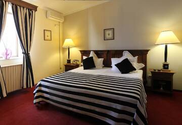 Фото номера Стандартный двухместный номер с 1 кроватью Отель Arc de Triomphe by Residence Hotels г. Бухарест 3