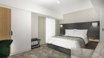 Фото номера Люкс с кроватью размера &quot;king-size&quot; и гостиной Отель Holiday Inn Bucharest - Times г. Бухарест 2