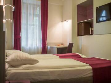 Фото номера Стандартный двухместный номер с 2 отдельными кроватями Отель Hotel Trianon г. Бухарест 8