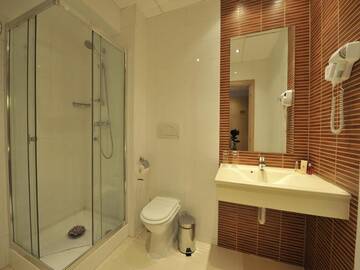 Фото номера Стандартный двухместный номер с 1 кроватью Отель RIN Grand Hotel г. Бухарест 8